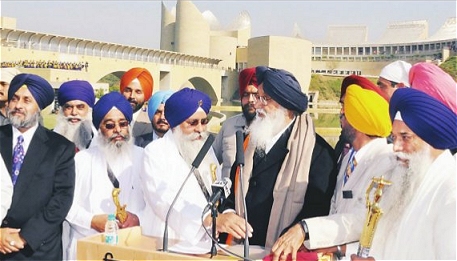 Badal given Siropa by Takht Jathedars for his 