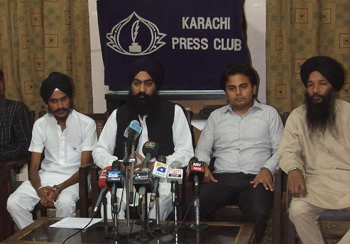 Pakistani Sikh representatives speak before the Karachi Press Club