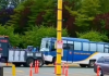 Canadian Gurdwaras Alarmed as Hundreds of Saroops Transported Via Commercial Container Ship by SGPC Dilapidated SGPC Bus Being Towed From Vancouver Port with Sacred 225 Saroops